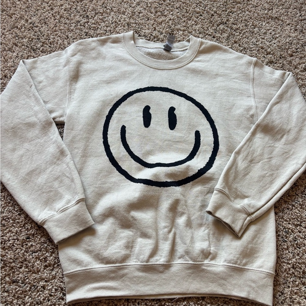 Woman’s Cream Smiley Face Sweater